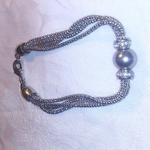 Four silver tone chain silver ball rhinestone bracelet